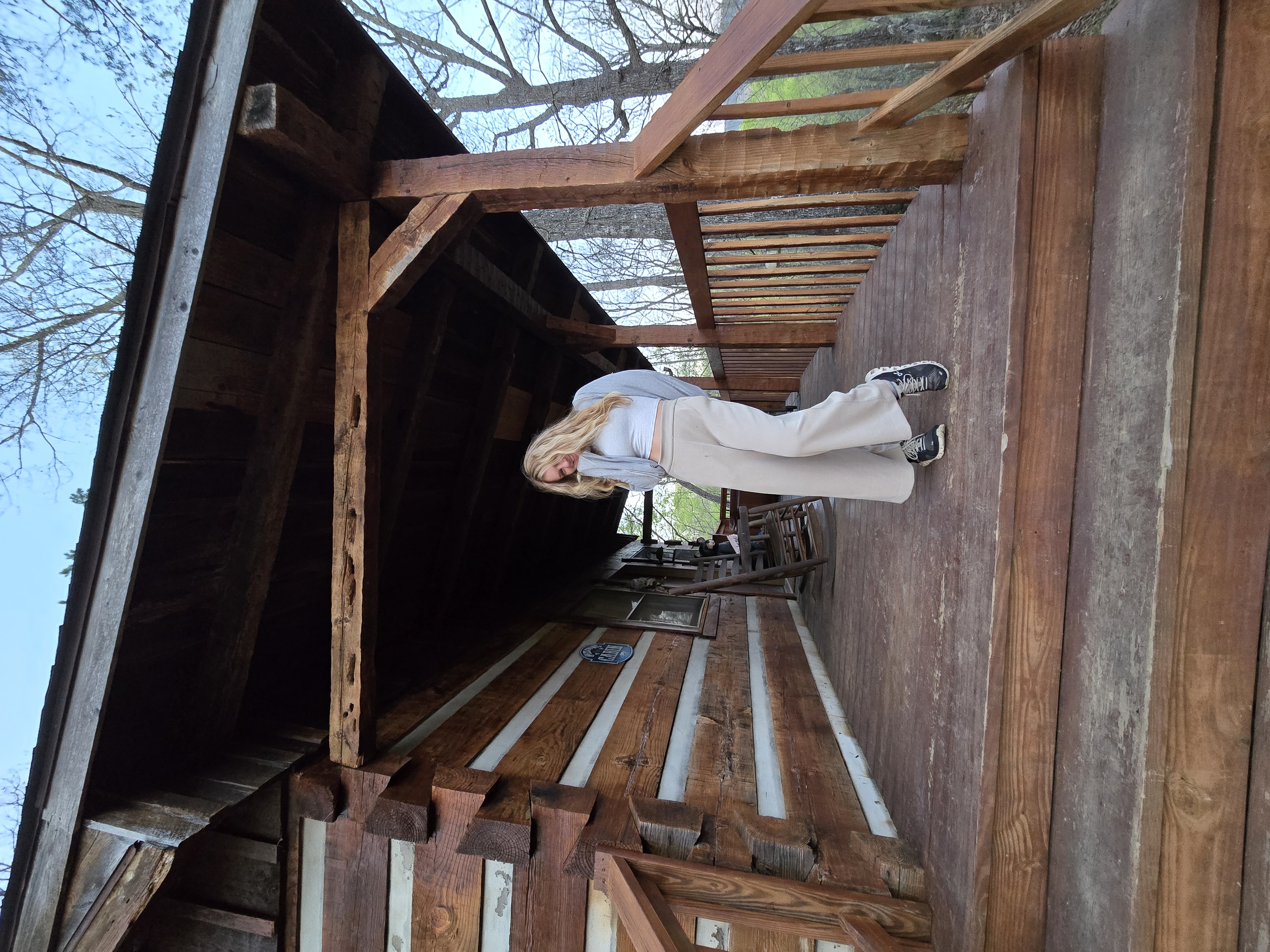 Danielle on a wooden porch